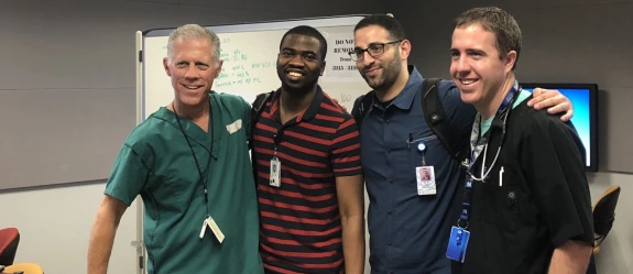 4 fellows smiling