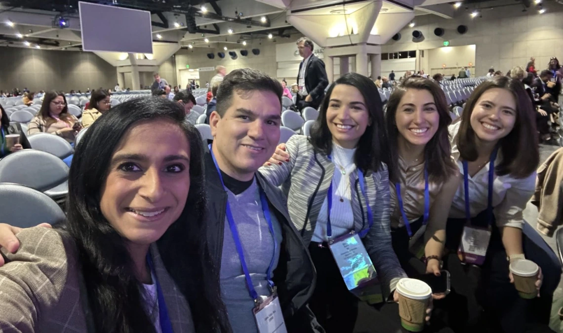 5 fellows smiling, selfie