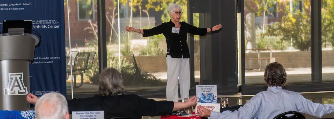 Edna Silva, RN, leads 2024 UAAC Symposium participants in the practice of Tai Chi Chuan