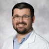 Justin T. Dunn, MD